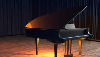 grand piano on the stage of concert hall or small jazz club
